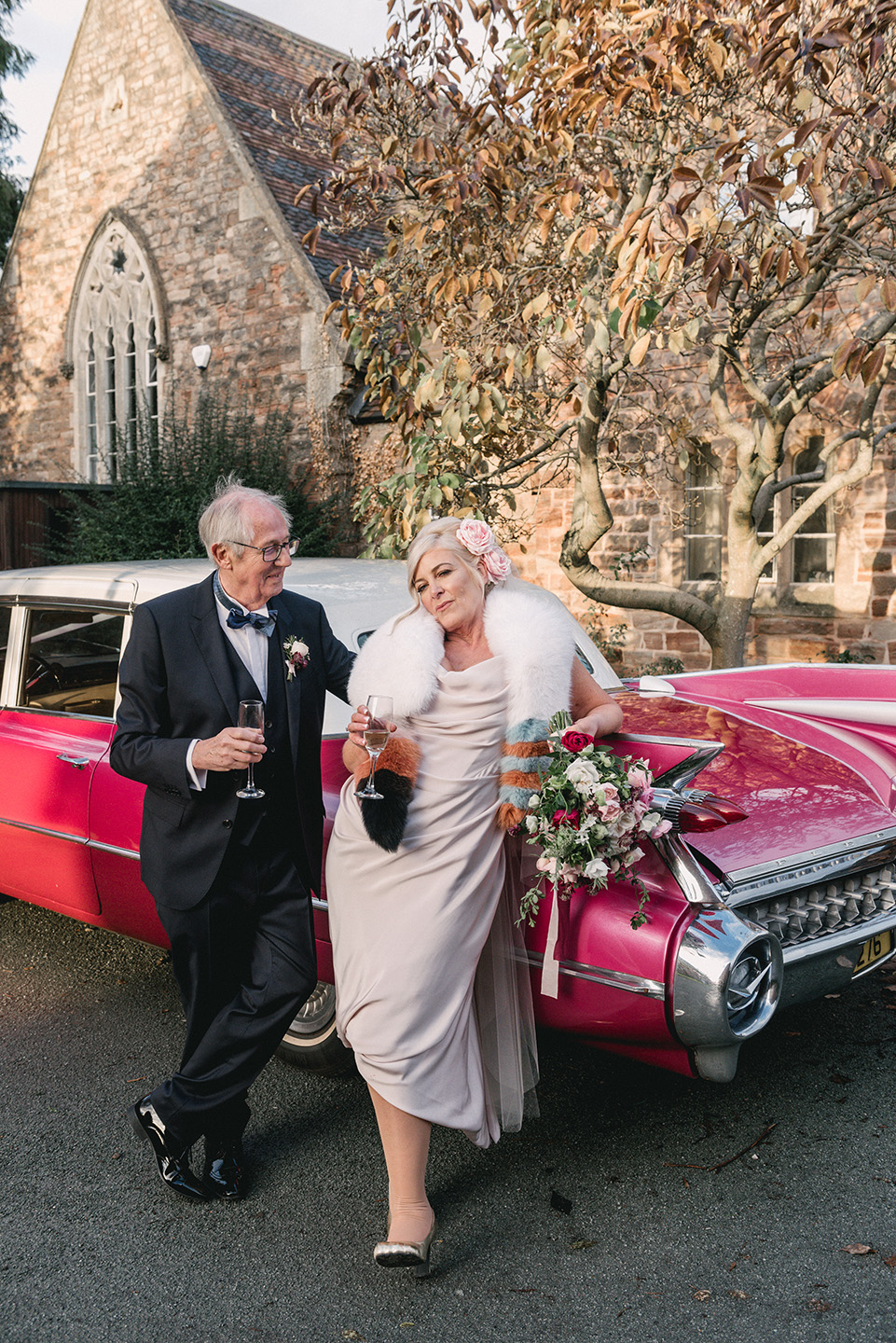 Cool wedding photos with pink cadillac wedding car in Bridgnorth by West Midlands wedding photographer byGarazi